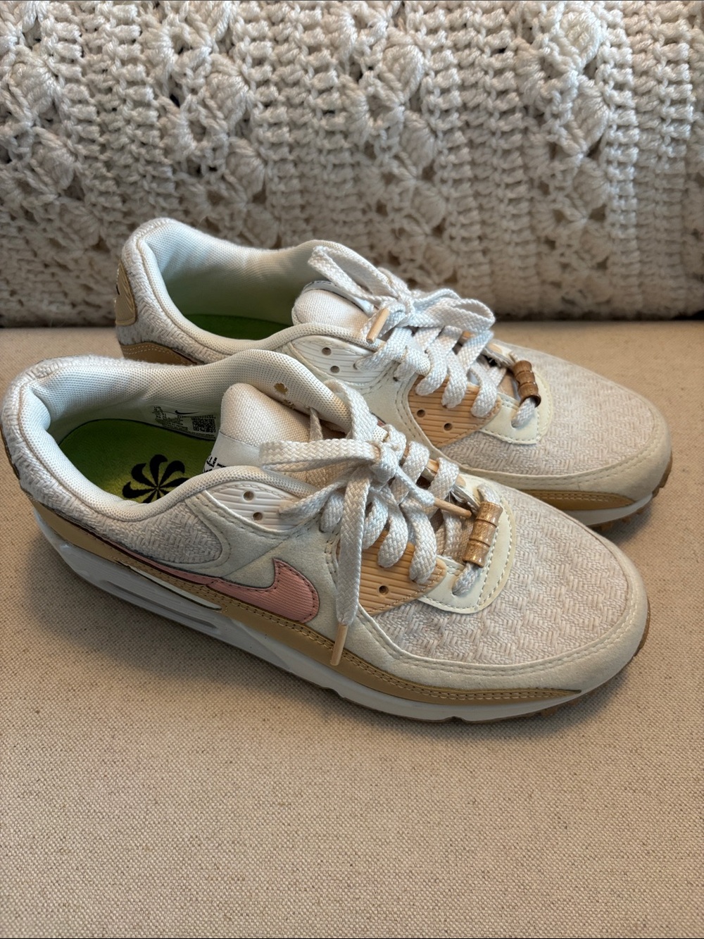 Nike Women’s Low-Top Sneakers in Cream with Pink Swoosh and Tan Accents